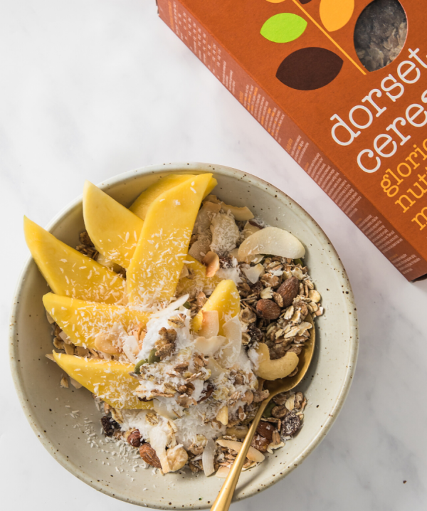 tropical mango and coconut muesli bowl